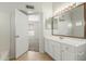 Bathroom with a vanity and view into the Primary bedroom at 21621 N 48Th Pl, Phoenix, AZ 85054