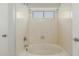 Bathroom features a soaking tub and updated fixtures at 21621 N 48Th Pl, Phoenix, AZ 85054