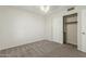 Bedroom features neutral carpeting at 21621 N 48Th Pl, Phoenix, AZ 85054