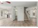 View of foyer leading to the kitchen and staircase at 21621 N 48Th Pl, Phoenix, AZ 85054