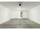 Spacious garage includes overhead lighting, water heater, and access door at 21621 N 48Th Pl, Phoenix, AZ 85054