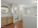 Hallway with built-in storage, and access to bathroom at 21621 N 48Th Pl, Phoenix, AZ 85054
