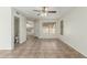 Open living space with tile flooring, ceiling fan, and great natural light at 21621 N 48Th Pl, Phoenix, AZ 85054