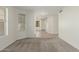 Bright living room featuring neutral colors and natural light from a large window at 21621 N 48Th Pl, Phoenix, AZ 85054