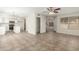 Open-concept layout showcases the living area seamlessly flowing into the kitchen at 21621 N 48Th Pl, Phoenix, AZ 85054
