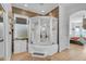 Updated bathroom features a multi-jet shower and modern vanity at 22346 N 104Th Ln, Peoria, AZ 85383