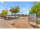 Sign displaying Alta Vista Park rules and regulations near walking path at 22346 N 104Th Ln, Peoria, AZ 85383