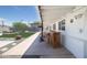 Spacious covered patio with bar, backyard with artificial grass, hardscape, and outdoor seating at 2320 E Mulberry Dr, Phoenix, AZ 85016