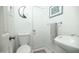 Clean bathroom with a modern sink, toilet, and minimalist decor for a refreshing feel at 2320 E Mulberry Dr, Phoenix, AZ 85016