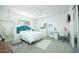 Serene bedroom featuring a plush bed, modern decor, and ample natural light at 2320 E Mulberry Dr, Phoenix, AZ 85016