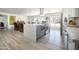 Open kitchen showcasing a large island with seating and stainless steel appliances at 2320 E Mulberry Dr, Phoenix, AZ 85016