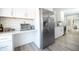 Bright kitchen with stainless steel appliances, marble countertops, and subway tile backsplash at 2320 E Mulberry Dr, Phoenix, AZ 85016