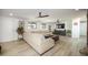 Spacious living room with a comfortable sectional sofa, ceiling fans, and natural light at 2320 E Mulberry Dr, Phoenix, AZ 85016