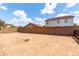 Large backyard with dirt and a block fence at 2893 E Cherry Hills Dr, Chandler, AZ 85249