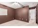 A clean and open bedroom with a ceiling fan and natural light from a window at 2893 E Cherry Hills Dr, Chandler, AZ 85249
