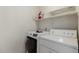 Laundry room with white washer and dryer at 2893 E Cherry Hills Dr, Chandler, AZ 85249