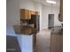 Well-lit kitchen with granite countertops, stainless steel appliances at 3237 E Fremont Rd, Phoenix, AZ 85042