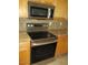 Modern stainless steel oven and microwave with granite countertops at 3237 E Fremont Rd, Phoenix, AZ 85042