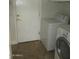 A functional laundry area equipped with a washer and dryer at 3237 E Fremont Rd, Phoenix, AZ 85042