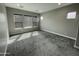 The spacious bedroom boasts lots of natural light from its large windows, creating a welcoming space at 32978 N 131St Dr, Peoria, AZ 85383