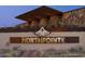 Elegant entrance sign for Northpointe with stone accents and manicured landscaping at 32978 N 131St Dr, Peoria, AZ 85383