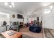 Bright living room with a window, a beanbag chair, and exercise equipment at 3418 W Maldonado Rd, Phoenix, AZ 85041