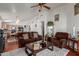 Open-concept living room with hardwood floors and ample seating at 3418 W Maldonado Rd, Phoenix, AZ 85041