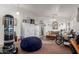 Living room with wall decorations, furniture, and a blue beanbag at 3418 W Maldonado Rd, Phoenix, AZ 85041