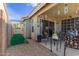 Outdoor patio with seating, string lights and plants creating a peaceful retreat at 3418 W Maldonado Rd, Phoenix, AZ 85041