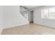 Open living area with tile floors, stairs, and bright natural light at 3511 E Baseline Rd # 1085, Phoenix, AZ 85042