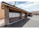 A well-maintained mailbox kiosk made of stone with an area for residents to pick up their mail at 3511 E Baseline Rd # 1085, Phoenix, AZ 85042