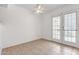 Bright room featuring tile flooring and patio doors for natural light at 3511 E Baseline Rd # 1085, Phoenix, AZ 85042