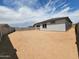 Spacious backyard ready for landscaping or custom outdoor features at 37069 W Prado St, Maricopa, AZ 85138