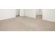 Spacious carpeted bedroom with neutral colors and ample natural light at 37069 W Prado St, Maricopa, AZ 85138