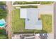 Aerial shot of the property showcasing a large backyard, patio, and surrounding neighborhood at 4010 E Catalina Dr, Phoenix, AZ 85018