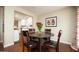 Cozy dining area featuring a round table with chairs and a view of the kitchen at 4010 E Catalina Dr, Phoenix, AZ 85018