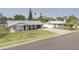 Charming single-story home with a well-manicured front lawn and a covered patio, perfect for enjoying the Arizona sunshine at 4010 E Catalina Dr, Phoenix, AZ 85018