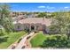 Stunning aerial view of the property highlighting the beautifully landscaped yard and inviting entryway at 4061 E Hope St, Mesa, AZ 85205