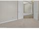 Neutral bedroom with carpet and arched entryways at 4061 E Hope St, Mesa, AZ 85205