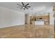 Open floor plan with a modern kitchen and an expansive living area at 4061 E Hope St, Mesa, AZ 85205