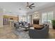 Inviting living room with fireplace and open kitchen layout at 4061 E Hope St, Mesa, AZ 85205