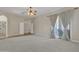 Large main bedroom with an open patio and private entrance at 4061 E Hope St, Mesa, AZ 85205