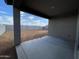 Covered patio overlooking spacious backyard with block fence at 4345 E Brook Lynn Pl, San Tan Valley, AZ 85143