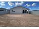 Large backyard with block fencing and covered patio, perfect for outdoor living and entertaining at 4345 E Brook Lynn Pl, San Tan Valley, AZ 85143