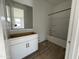 Bright bathroom with shower and white vanity, exuding a clean aesthetic at 4345 E Brook Lynn Pl, San Tan Valley, AZ 85143