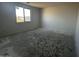 Bedroom with ample light, large window, and neutral walls creating a bright space at 4345 E Brook Lynn Pl, San Tan Valley, AZ 85143