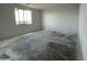 Bright bedroom featuring a large window and ample natural light at 4345 E Brook Lynn Pl, San Tan Valley, AZ 85143