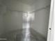 A bright, empty closet with shelving, perfect for storage at 4345 E Brook Lynn Pl, San Tan Valley, AZ 85143
