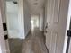 An entrance with an open view of a hallway that features stylish tile flooring and white walls at 4345 E Brook Lynn Pl, San Tan Valley, AZ 85143