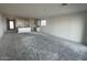 Spacious open-concept living room with neutral walls, awaiting personalization at 4345 E Brook Lynn Pl, San Tan Valley, AZ 85143